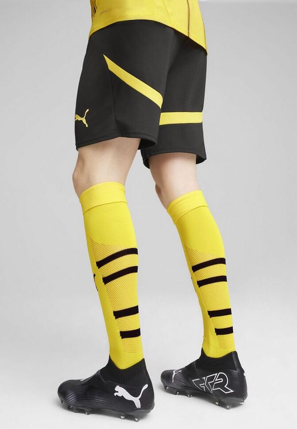 Puma - Szorty Borussia Dortmund 2024/25. Kolor: czarny, wielokolorowy, żółty. Długość: krótkie. Sport: piłka nożna