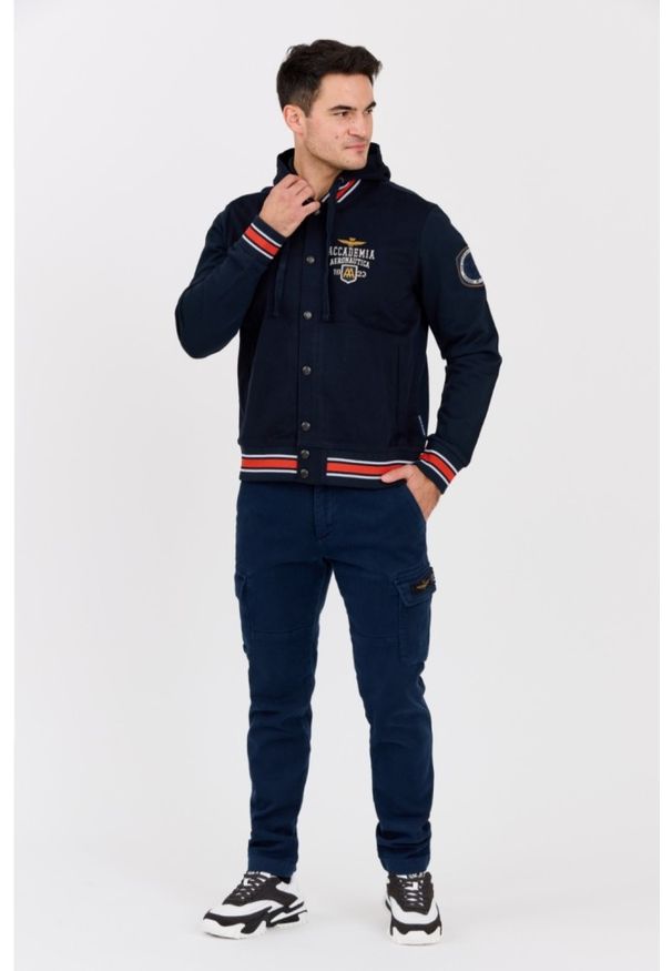 Aeronautica Militare - AERONAUTICA MILITARE Granatowa męska kurtka bomberka Accademia, Rozmiar 50. Kolor: niebieski. Materiał: materiał, bawełna, elastan. Styl: klasyczny