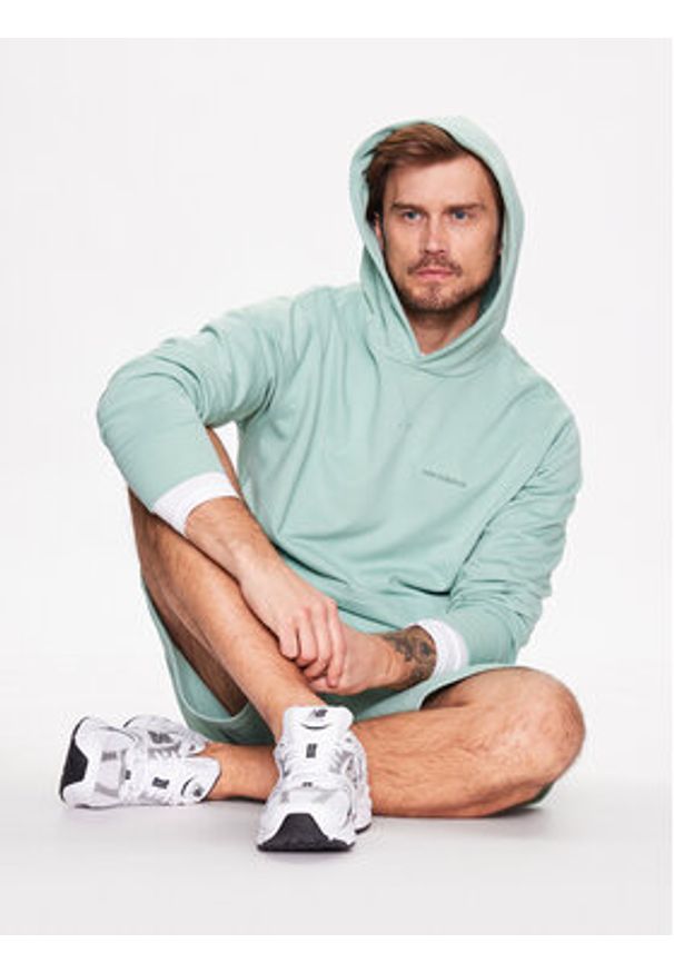 New Balance Bluza MT23565S Zielony Relaxed Fit. Kolor: zielony. Materiał: bawełna