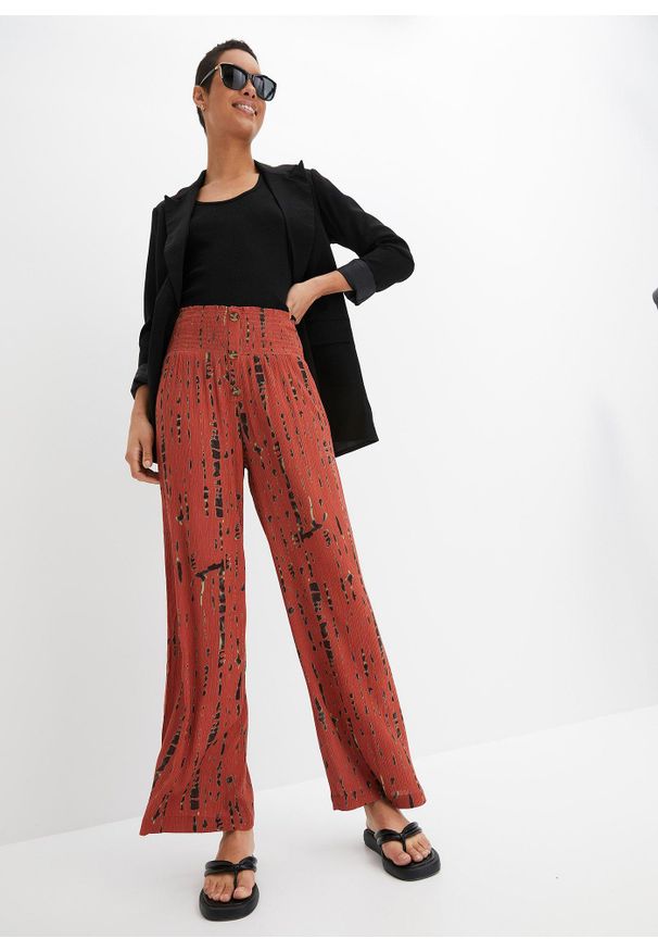 bonprix - Spodnie palazzo z lejącej wiskozy. Kolor: czerwony. Materiał: wiskoza. Wzór: nadruk