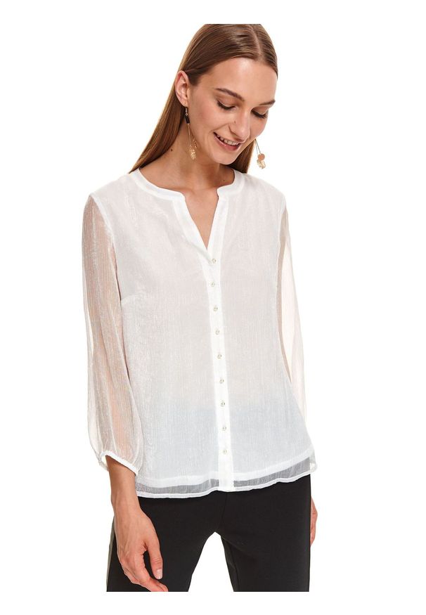 TOP SECRET - Elegancka bluzka o luźnym kroju. Kolor: biały. Materiał: tiul. Długość: długie. Wzór: aplikacja. Sezon: jesień. Styl: elegancki