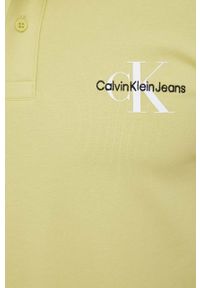 Calvin Klein Jeans polo męski kolor żółty z nadrukiem. Typ kołnierza: polo. Kolor: żółty. Materiał: dzianina. Długość: krótkie. Wzór: nadruk #2
