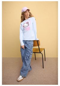 bonprix - Koszulka z długim rękawem z motywem Hello Kitty, z czystej bawełny. Kolor: niebieski. Materiał: bawełna. Długość rękawa: długi rękaw. Długość: długie. Wzór: motyw z bajki #2