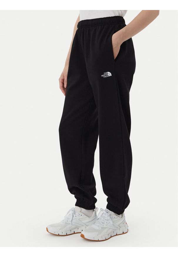 The North Face Spodnie dresowe Evolution Simple Dome NF0A8CWV Czarny Regular Fit. Kolor: czarny. Materiał: syntetyk