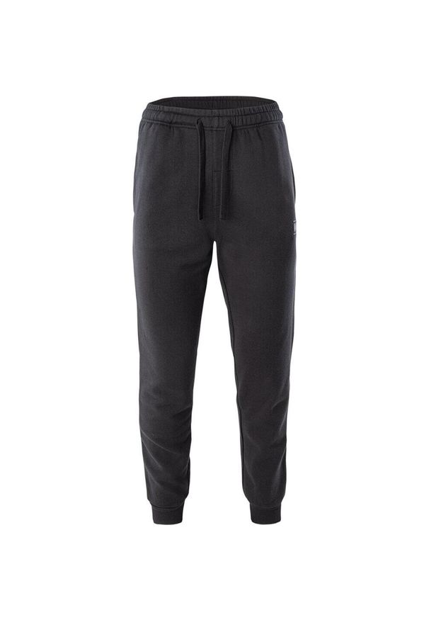 Męskie spodnie dresowe bawełniane treningowe joggery Magnum Ibis. Kolor: czarny. Materiał: dresówka, bawełna. Długość: długie