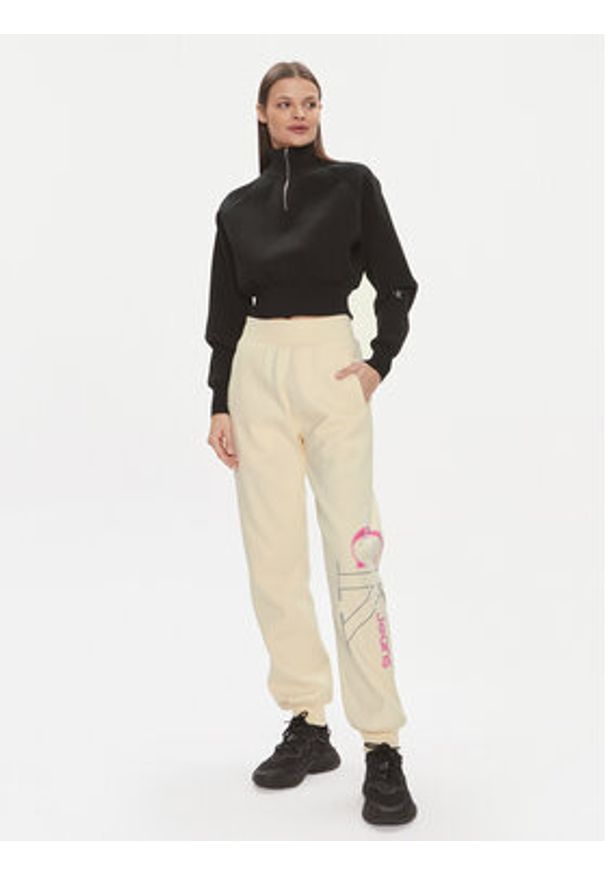 Calvin Klein Jeans Spodnie dresowe Bold Monologo J20J222606 Żółty Relaxed Fit. Kolor: żółty. Materiał: bawełna