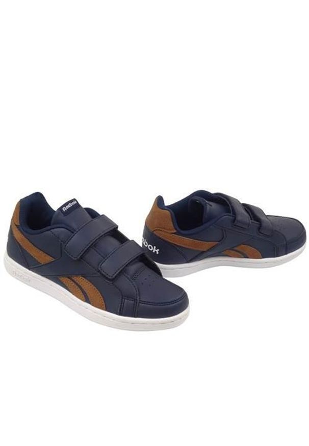 Buty do chodzenia dla dzieci Reebok Royal Prime Collegiate. Zapięcie: rzepy. Kolor: niebieski, wielokolorowy. Materiał: syntetyk, tkanina, materiał. Szerokość cholewki: normalna. Model: Reebok Royal. Sport: turystyka piesza