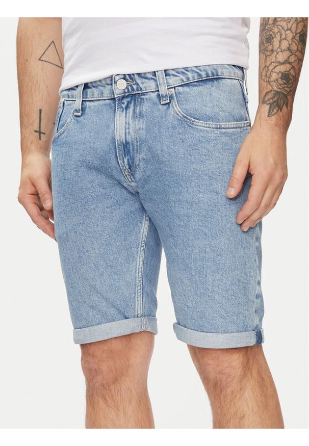 Tommy Jeans Szorty jeansowe Ronnie DM0DM19154 Niebieski Slim Fit. Kolor: niebieski. Materiał: bawełna