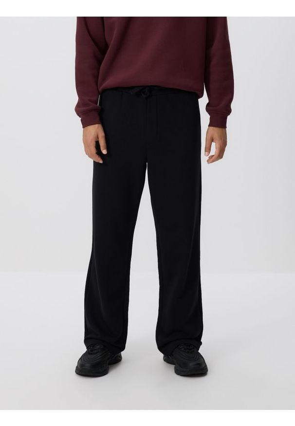 Reserved - Spodnie dresowe z bawełną - czarny. Kolor: czarny. Materiał: bawełna, dresówka