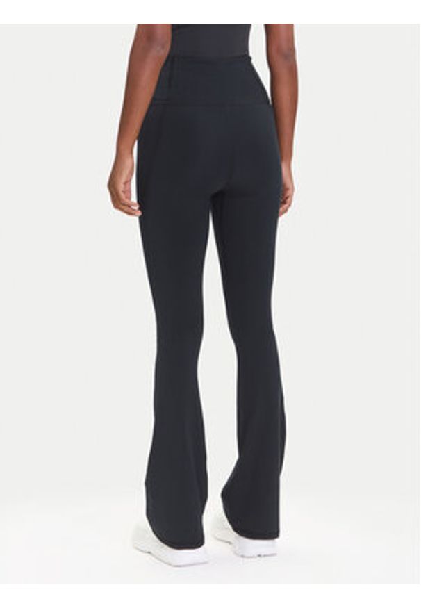 Under Armour Legginsy Motion 1379176 Czarny Slim Fit. Kolor: czarny. Materiał: syntetyk