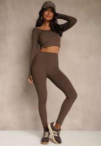 Renee - Brązowe Legginsy High Waist Ozdobione Przeszyciem Belanessa. Okazja: na co dzień. Stan: podwyższony. Kolor: brązowy. Wzór: aplikacja. Styl: casual