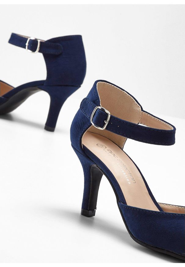 bonprix - Czółenka z paskiem na wąskim obcasie. Zapięcie: pasek. Kolor: niebieski. Materiał: skóra, welur. Obcas: na obcasie. Wysokość obcasa: średni