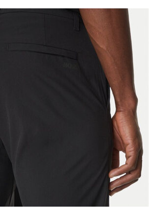 BOSS Spodnie materiałowe Commuter HexaStre 50529673 Czarny Slim Fit. Kolor: czarny. Materiał: syntetyk