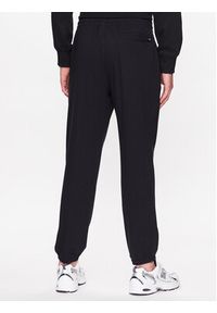 New Balance Spodnie dresowe MP31902 Czarny Regular Fit. Kolor: czarny. Materiał: bawełna, dresówka #4