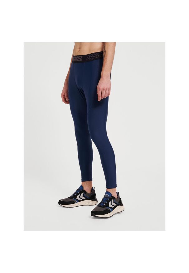 Legginsy Hummel TE Topaz. Kolor: niebieski. Materiał: jersey, materiał. Sport: fitness