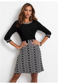 bonprix - Rozkloszowana sukienka dzianinowa w żakardowy wzór. Kolor: czarny. Materiał: żakard, dzianina. Styl: elegancki #1