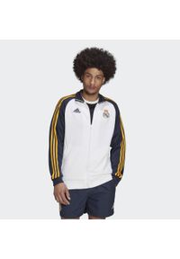 Adidas - Real Madrid DNA 3-Stripes Track Top. Kolor: niebieski, wielokolorowy, biały. Materiał: dresówka, materiał