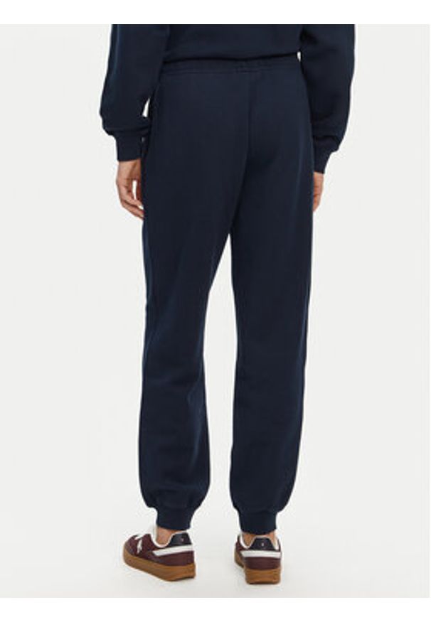 TOMMY HILFIGER - Tommy Hilfiger Spodnie dresowe WW0WW45576 Granatowy Regular Fit. Kolor: niebieski. Materiał: bawełna