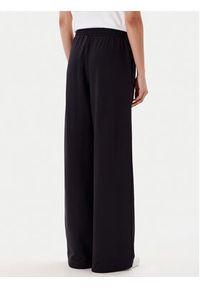 Adidas - adidas Spodnie dresowe Essentials JW2812 Czarny Wide Leg. Kolor: czarny. Materiał: bawełna #5