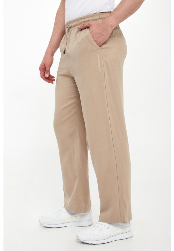 Emporio Armani Swimwear - Spodnie męskie z lnem EMPORIO ARMANI SWIMWEAR. Materiał: len