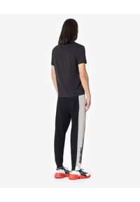 Kenzo - KENZO - Spodnie jogger z łączonych materiałów. Kolor: czarny. Materiał: materiał. Wzór: aplikacja #4