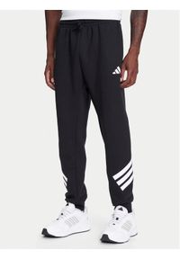 Adidas - adidas Spodnie dresowe Future Icons 3-Stripes JD4863 Czarny Regular Fit. Kolor: czarny. Materiał: syntetyk, bawełna #1