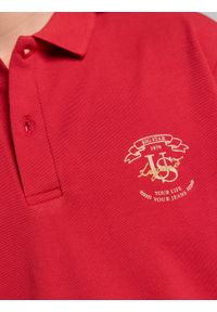 Big-Star - Koszulka chłopięca polo z bawełny organicznej czerwona Senanen 603. Okazja: na uczelnię, na co dzień. Typ kołnierza: polo. Kolor: czerwony. Materiał: bawełna. Wzór: aplikacja, haft. Styl: klasyczny, casual, elegancki