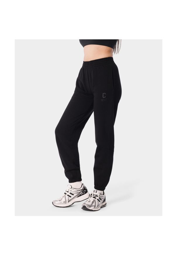 Spodnie dresowe sportowe dla kobiet Carpatree Varsity Chic. Kolor: czarny. Materiał: dresówka. Sport: fitness