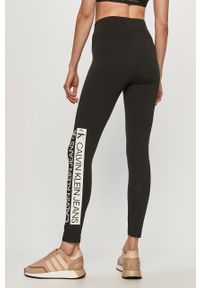 Calvin Klein Jeans - Legginsy. Kolor: czarny. Materiał: bawełna, dzianina, elastan. Wzór: nadruk #3