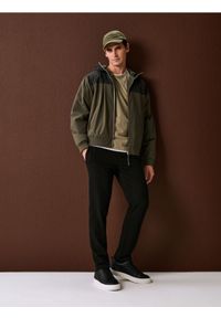 Sinsay - Spodnie dresowe jogger ottoman - czarny. Kolor: czarny. Materiał: dresówka #1