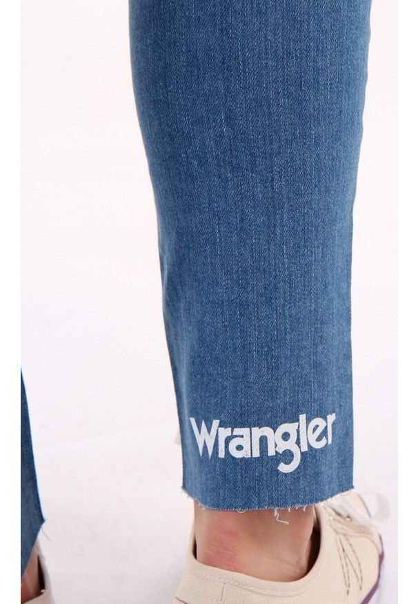 Wrangler - WRANGLER SLIM CROP DAMSKIE SPODNIE JEANSOWE RETRO ACTION W248GU124 112127961. Styl: retro