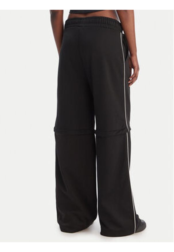 Hugo - HUGO Spodnie materiałowe Nateam 50554074 Czarny Regular Fit. Kolor: czarny. Materiał: syntetyk