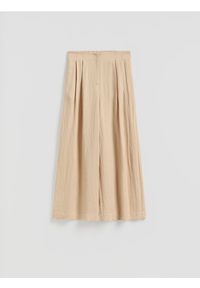 Reserved - Spodnie z lyocellem - beżowy. Kolor: beżowy. Materiał: wiskoza, tkanina