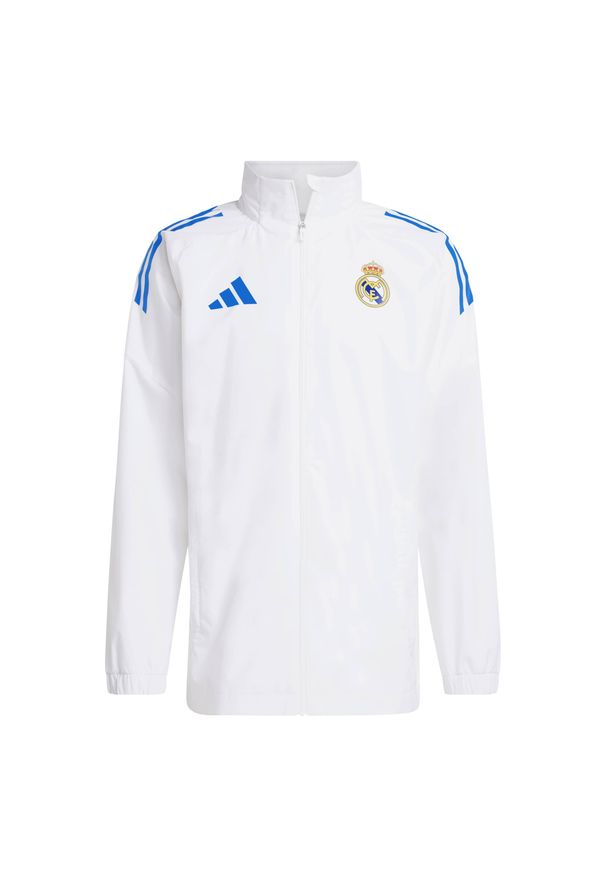 Adidas - Kurtka dresowa na zewnątrz Real Madryt EU 2025/26. Kolor: biały. Materiał: dresówka. Sport: piłka nożna