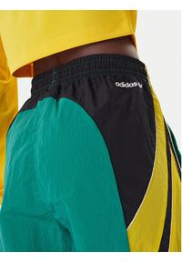 Adidas - adidas Spodnie dresowe Sport Santiago KD2971 Zielony Loose Fit. Kolor: zielony. Materiał: syntetyk #5