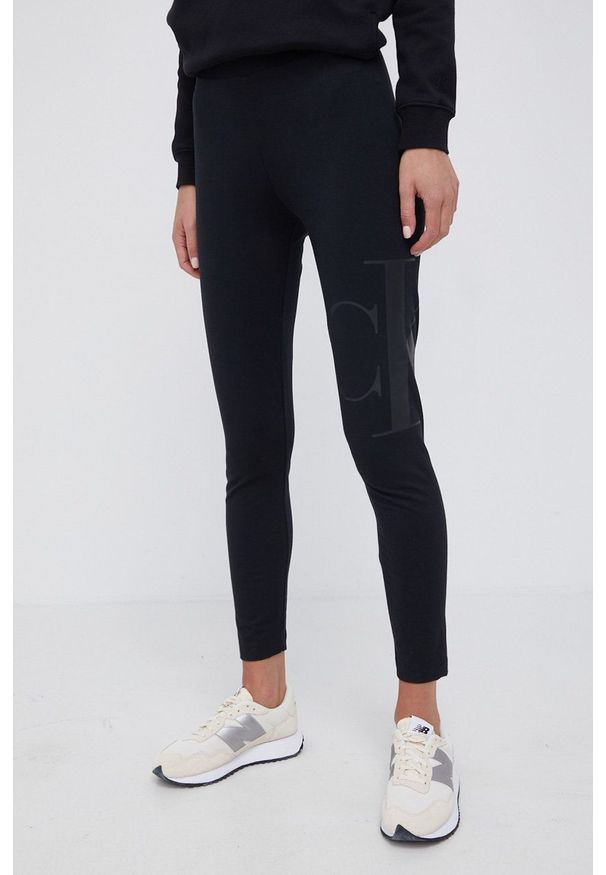 Calvin Klein Jeans Legginsy damskie kolor czarny gładkie. Kolor: czarny. Materiał: bawełna, dzianina. Wzór: gładki