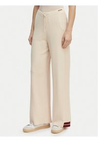 Guess Spodnie dresowe V6GB06 Z0651 Beżowy Wide Leg. Kolor: beżowy. Materiał: syntetyk #1