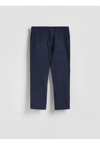 Reserved - Spodnie joggery - granatowy. Kolor: niebieski. Materiał: bawełna #1