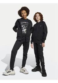 Adidas - adidas Spodnie dresowe Star Wars The Mandalorian™ JF3635 Czarny Regular Fit. Kolor: czarny. Materiał: bawełna. Wzór: motyw z bajki #1