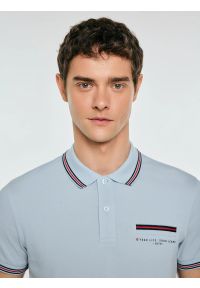 Big-Star - Koszulka męska polo z kontrastowym wykoŅczeniem niebieska Polos 400. Typ kołnierza: polo. Kolor: niebieski. Materiał: dzianina, materiał. Wzór: nadruk. Styl: elegancki, klasyczny, sportowy #4