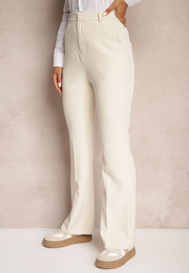 Renee - Beżowe Spodnie Dzwony High Waist z Imitacją Kieszeni Semirlla. Stan: podwyższony. Kolor: beżowy. Styl: klasyczny