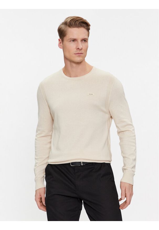 Calvin Klein Sweter K10K112534 Beżowy Slim Fit. Kolor: beżowy. Materiał: bawełna