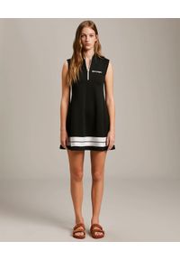 PALM ANGELS - Czarna sukienka dresowa. Kolor: czarny. Materiał: dresówka. Typ sukienki: rozkloszowane. Długość: mini #5