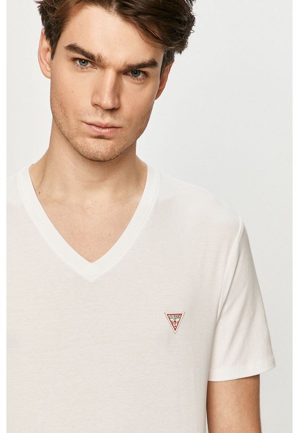 Guess - T-shirt. Kolor: biały. Materiał: dzianina. Wzór: gładki