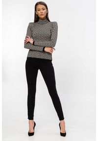 Balmain - BALMAIN Damska bluzka z golfem w czarny monogram. Typ kołnierza: golf. Kolor: beżowy. Materiał: dzianina. Długość rękawa: długi rękaw. Długość: długie