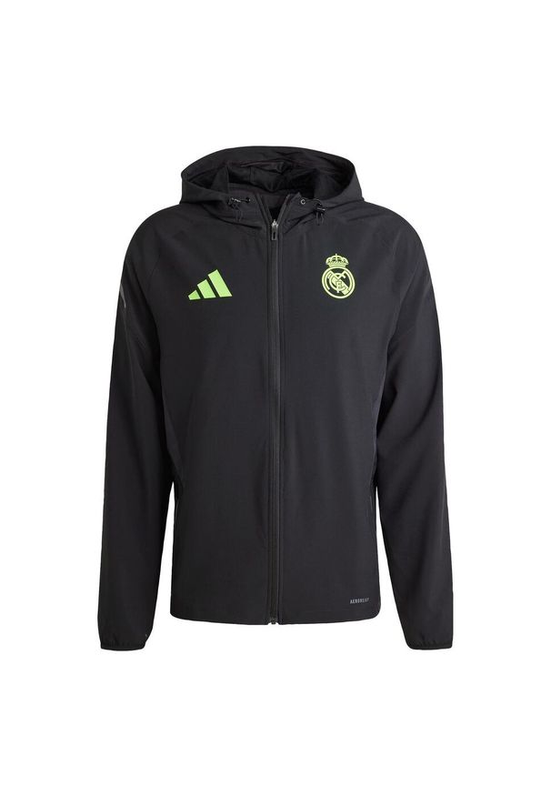 Adidas - Kurtka podróżna Real Madryt Tiro 25 Pro Vis Tech. Kolor: czarny, wielokolorowy, żółty. Materiał: dresówka. Sport: piłka nożna