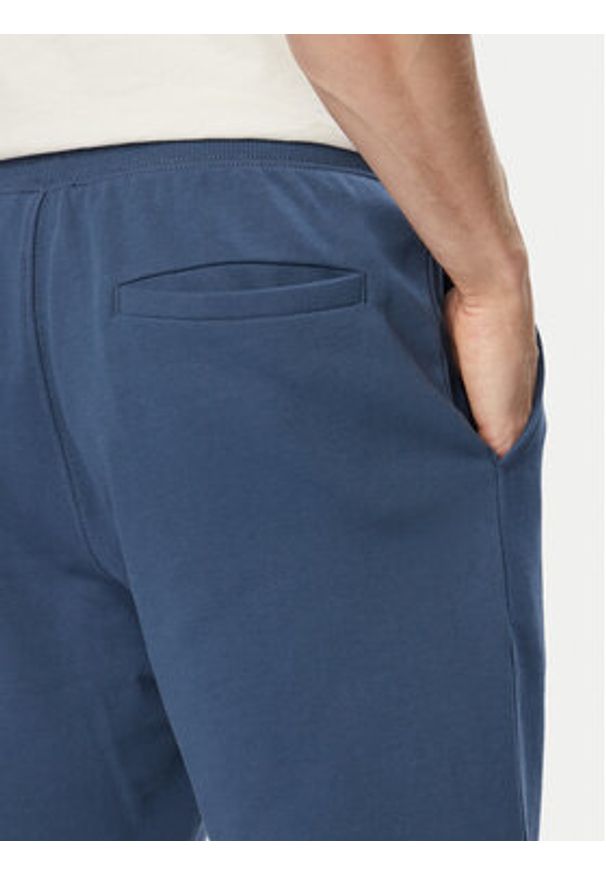 TOMMY HILFIGER - Tommy Hilfiger Szorty sportowe MW0MW37240 Niebieski Regular Fit. Kolor: niebieski. Materiał: bawełna. Styl: sportowy