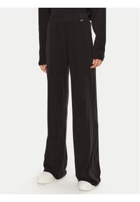 Guess Spodnie dresowe O4BB02 KCHZ2 Czarny Relaxed Fit. Kolor: czarny. Materiał: bawełna