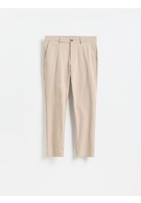 Reserved - Spodnie chino slim fit - beżowy. Kolor: beżowy. Materiał: tkanina, wiskoza