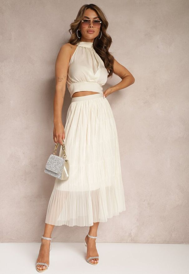 Renee - Jasnobeżowa Rozkloszowana Spódnica z Tiulu Wykończona Gumką w Pasie Risshara. Okazja: na co dzień. Kolor: beżowy. Materiał: tiul. Styl: casual, elegancki
